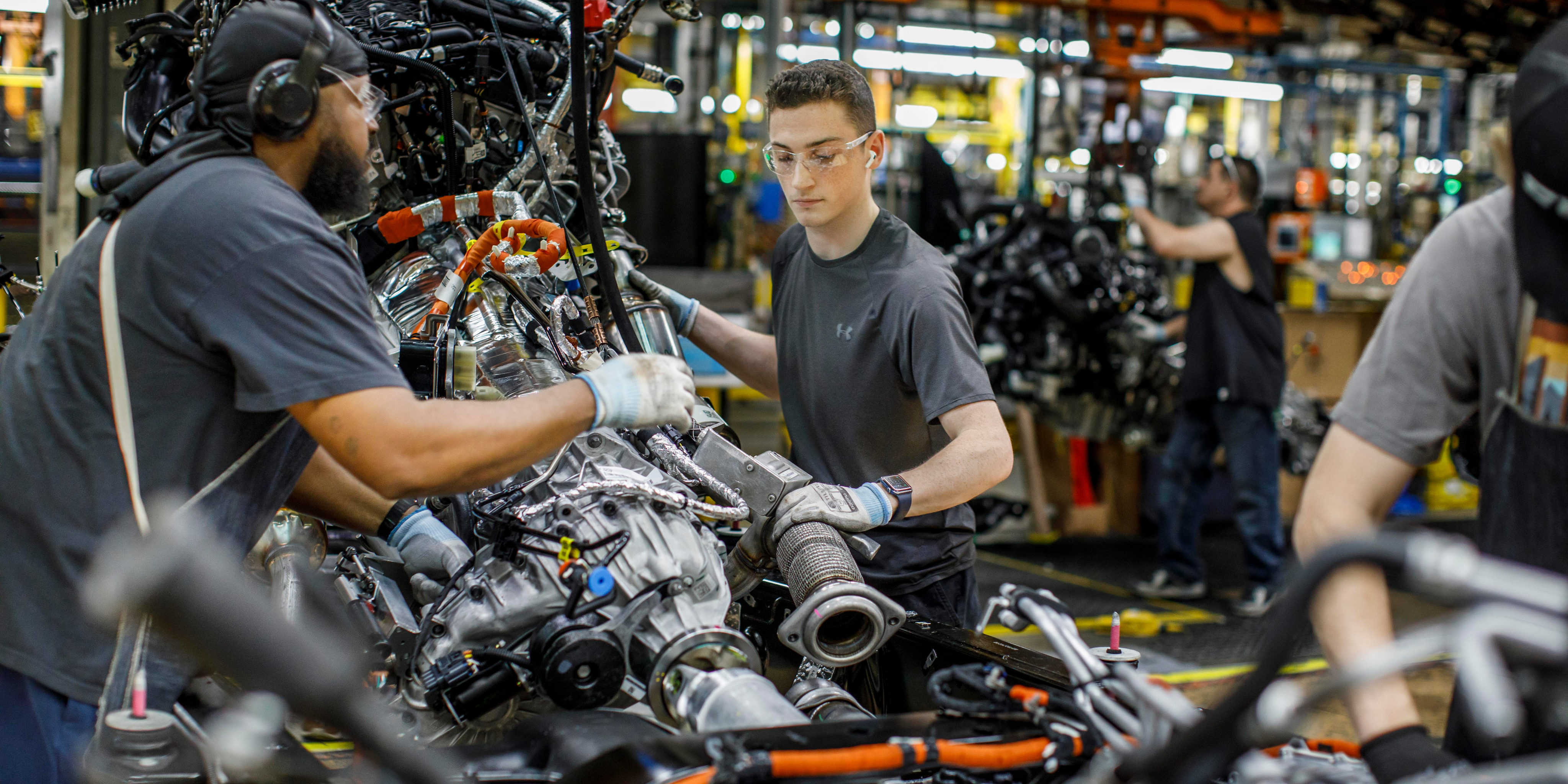 2 ford employees in vehicle assembly facility